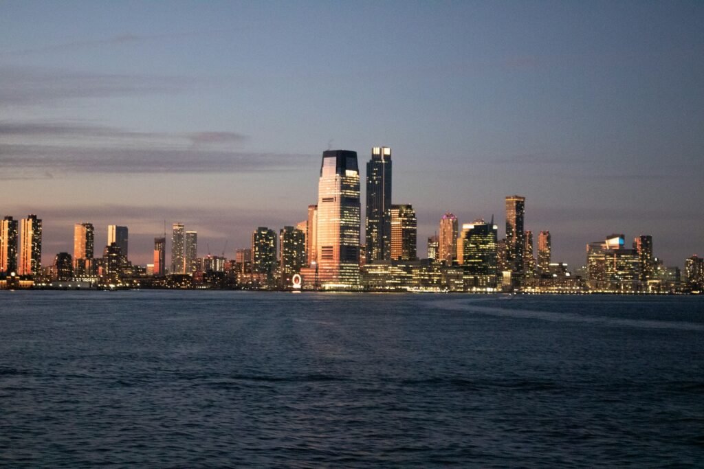 Jersey City, New Jersey skyline at dusk across the Hudson River